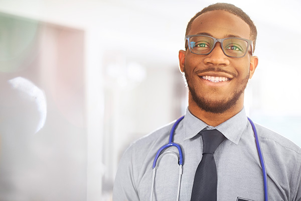 african american male doctor smiling