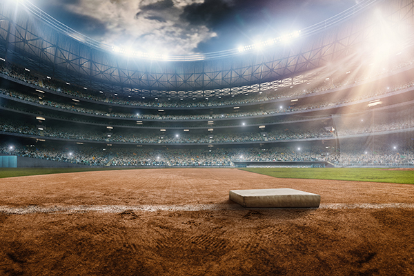 third base in dirt with view of stadium