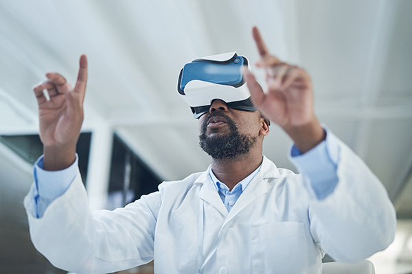 male doctor using vr headset