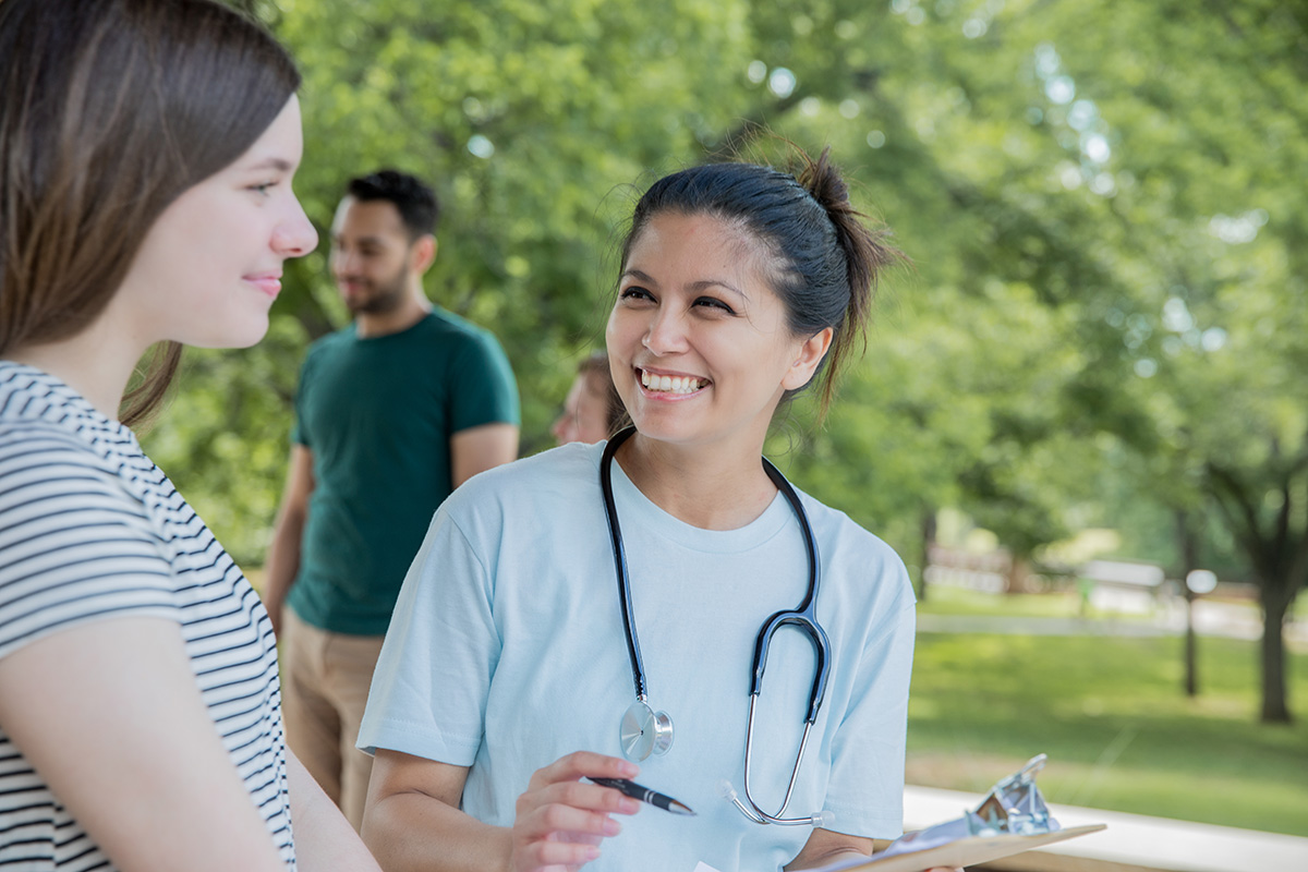 Young students talking outside